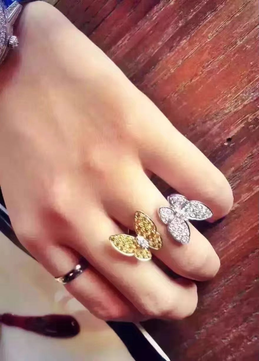 Two Butterfly Between the Finger Ring